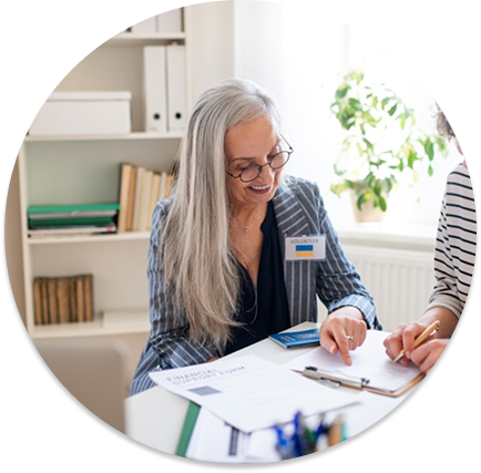 Financial adviser reviewing documents with a client